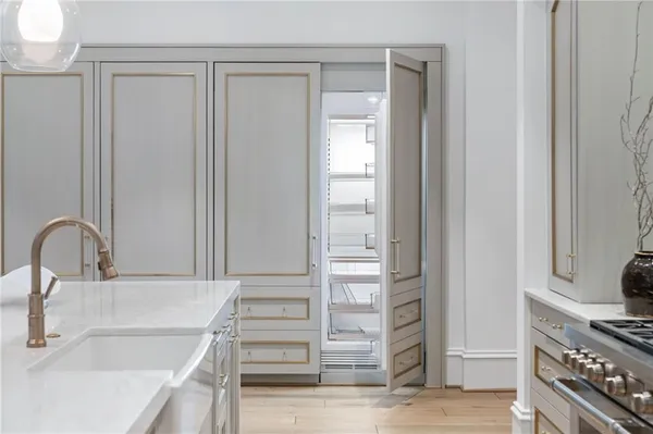 a view of a bathroom with a glass shower door