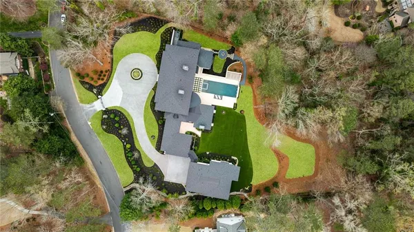 a room with furniture and a large window