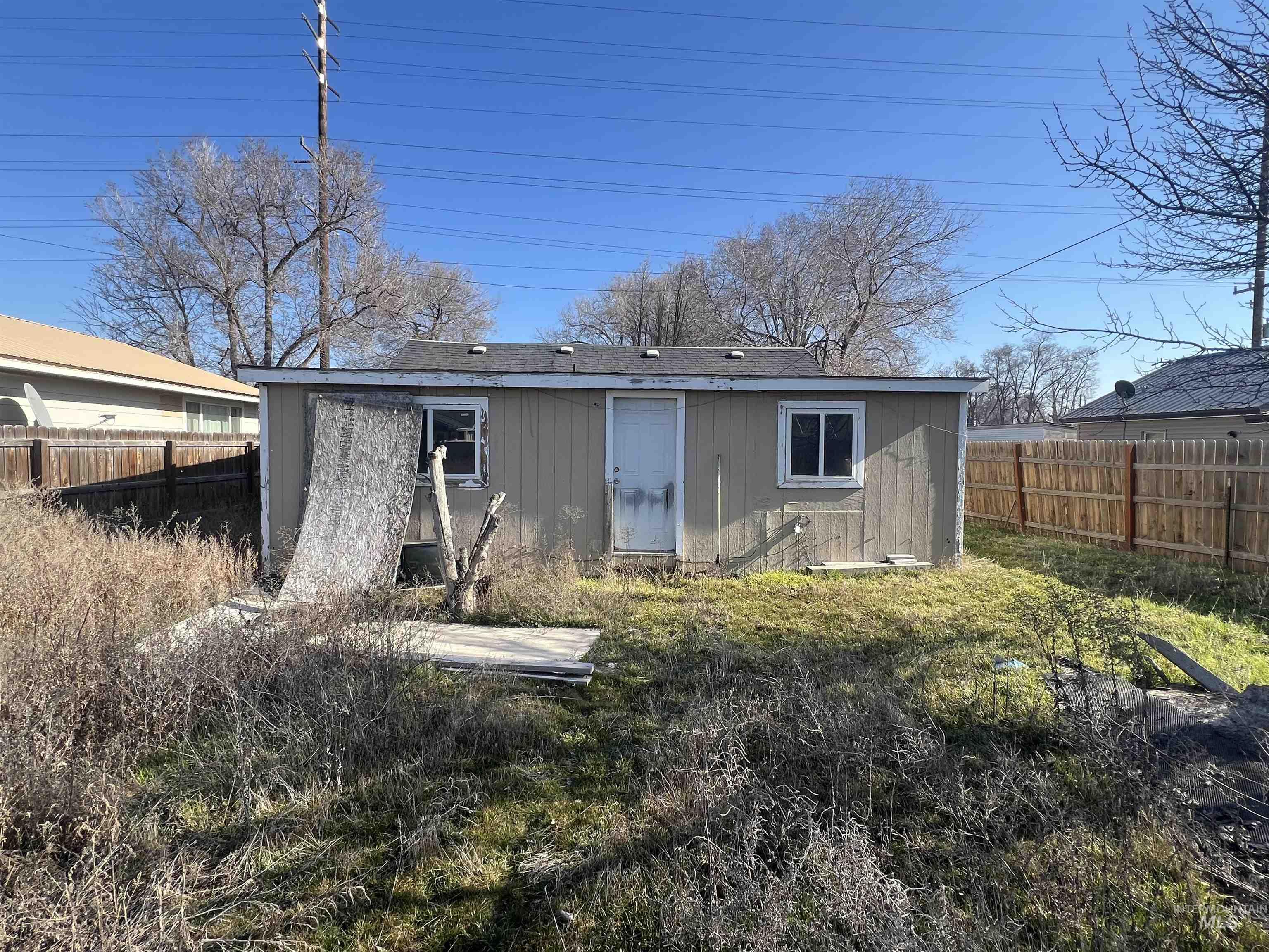 717 North 3rd Street Nyssa, OR 97913 - Photo 11 of 12 Rear view of property featuring a fenced backyard