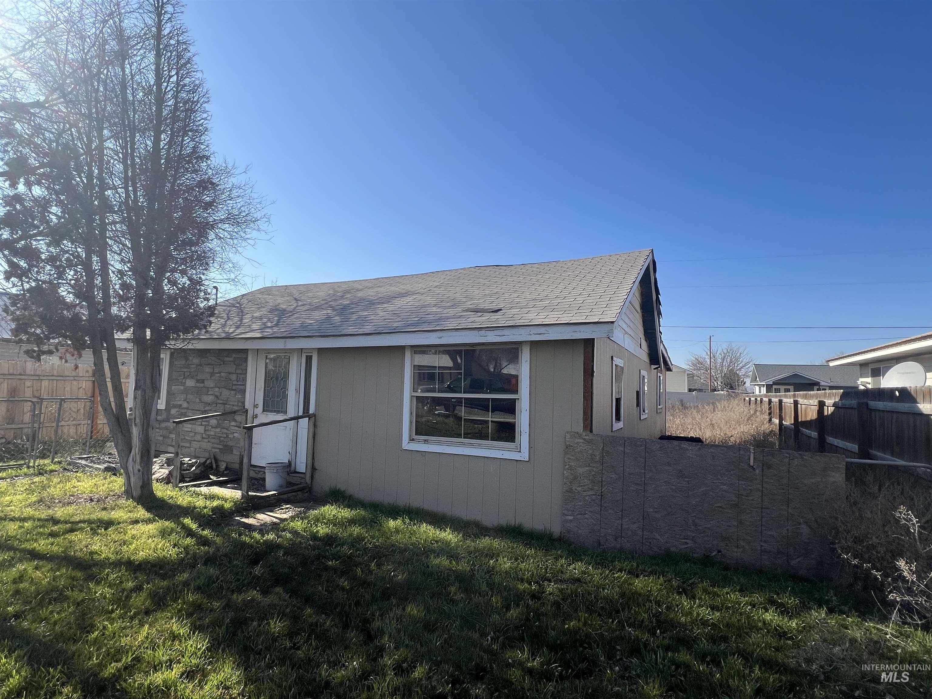 717 North 3rd Street Nyssa, OR 97913 - Photo 2 of 12 View of home's exterior featuring roof with shingles