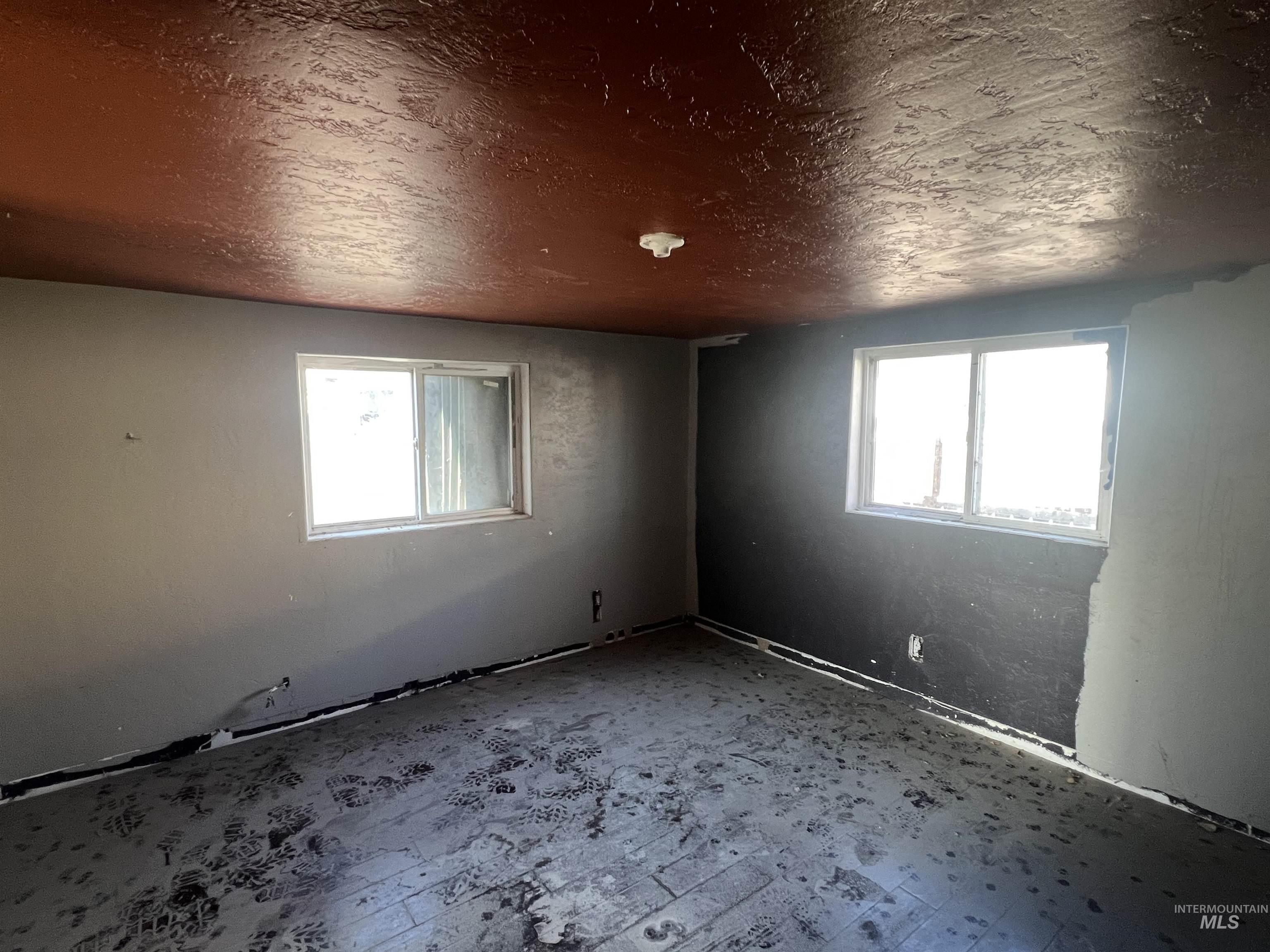 717 North 3rd Street Nyssa, OR 97913 - Photo 10 of 12 Unfurnished room featuring a textured ceiling