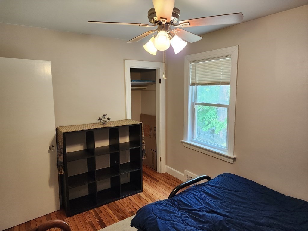 67 Sylvan Road Lancaster, MA 01523 - Photo 18 of 33 a bedroom with a bed and a window