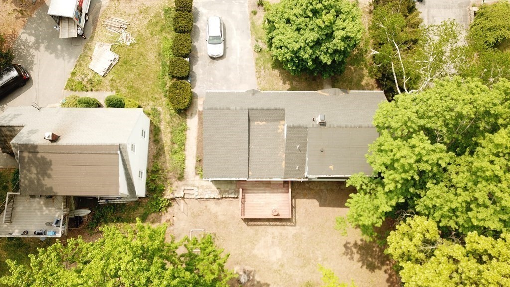 67 Sylvan Road Lancaster, MA 01523 - Photo 4 of 33 a picture of houses with yard