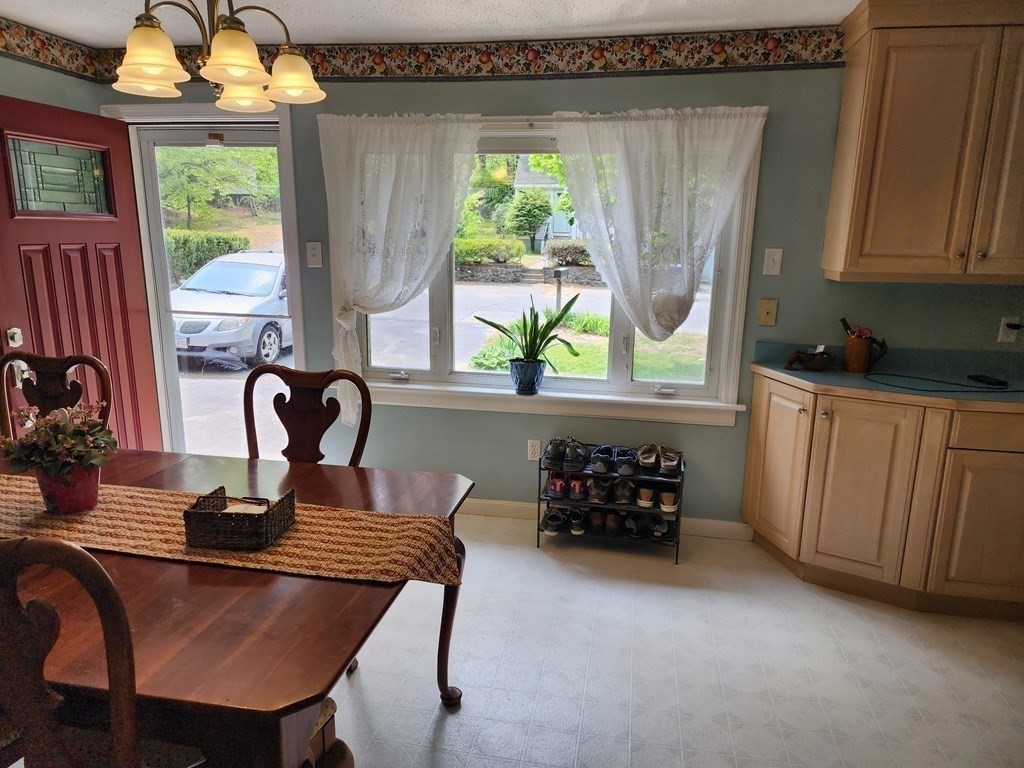 67 Sylvan Road Lancaster, MA 01523 - Photo 10 of 33 a dining room with furniture and window