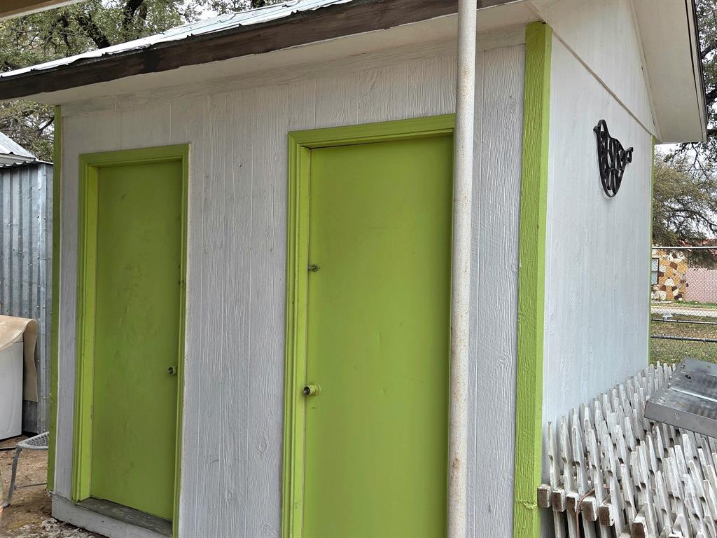 313 King Street Eden, TX 76837 - Photo 18 of 24 a front view of a house with a yard