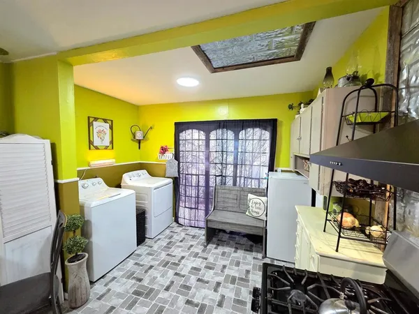 a room with furniture and window