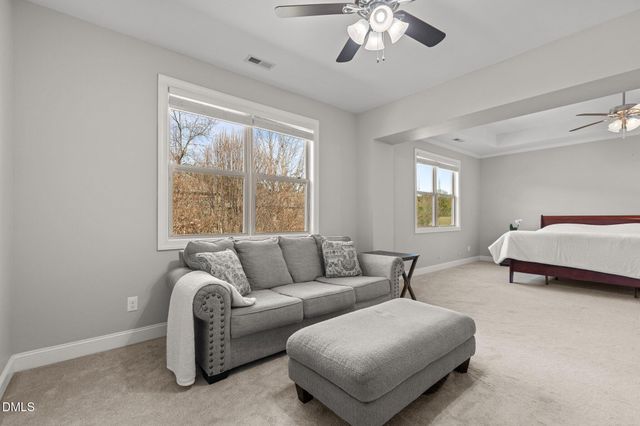 a view of a chairs and table on the deck