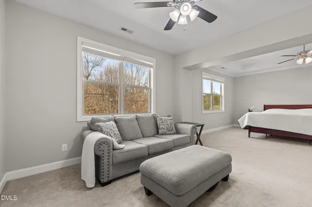 a view of a chairs and table on the deck