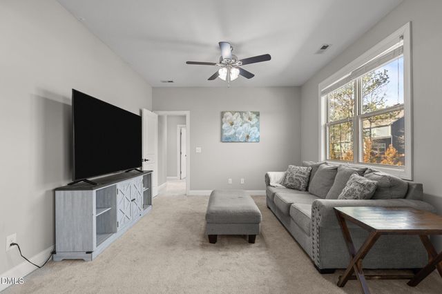 a picture of a bathroom with a mirror