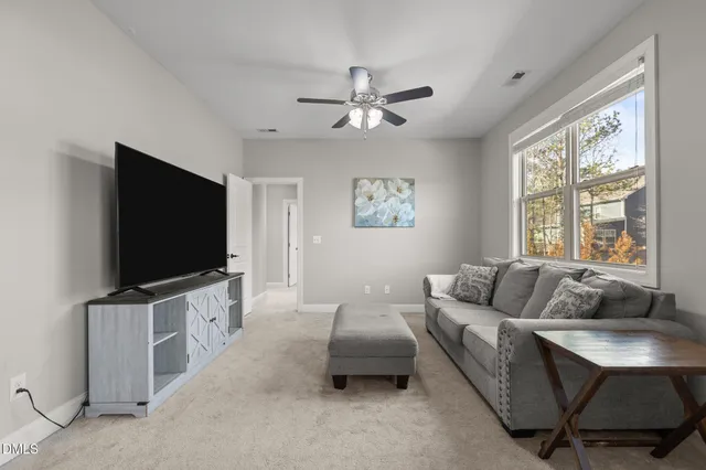 a picture of a bathroom with a mirror