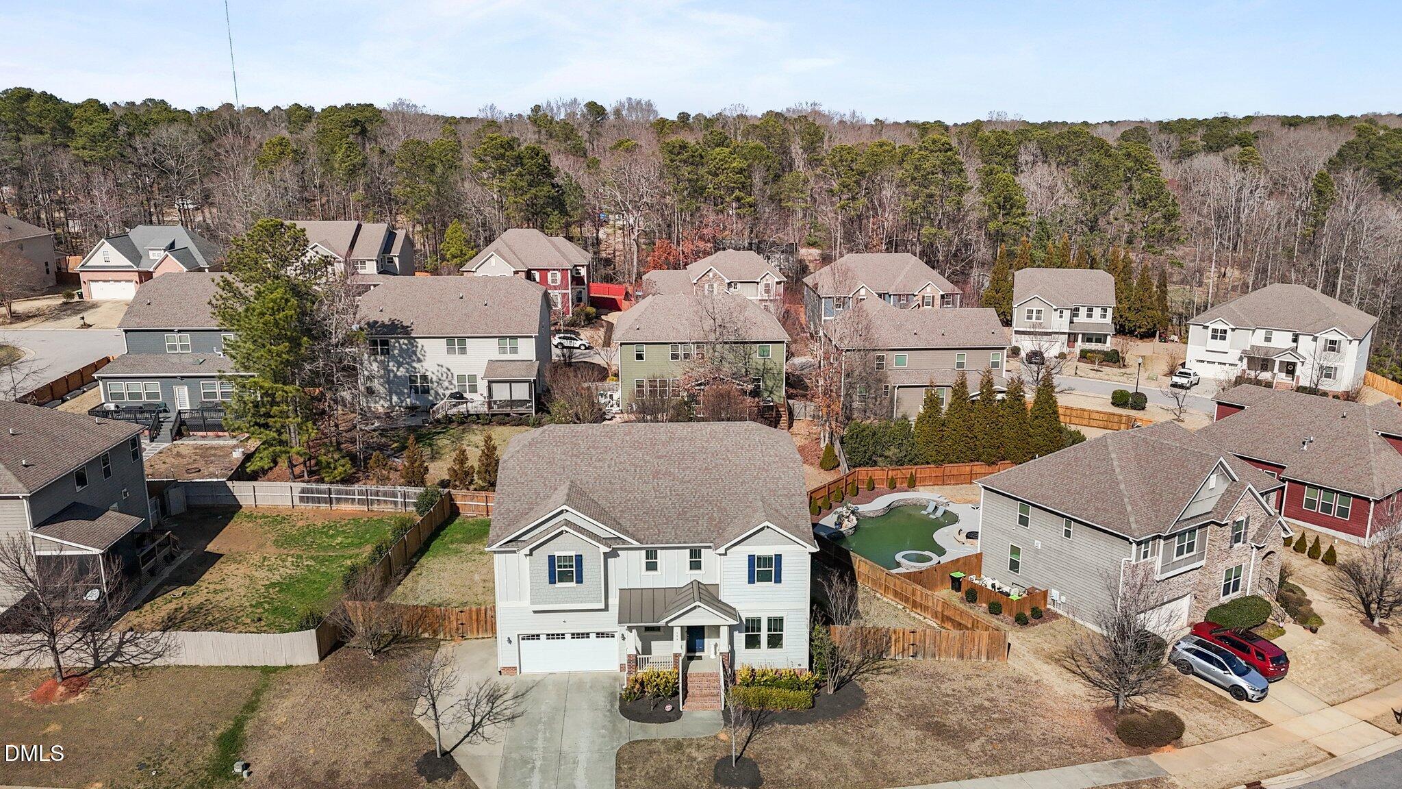 104 Highland Mist Circle Apex, NC 27539 - Photo 4 of 49 an aerial view of multiple house