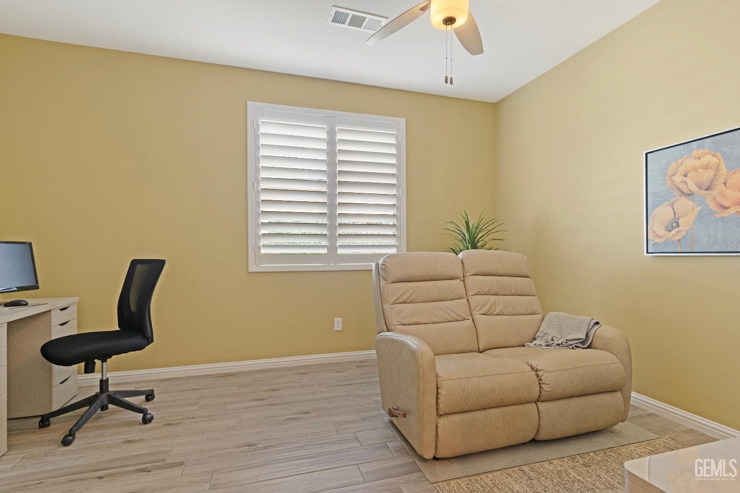 Undisclosed Address Bakersfield, CA 93311 - Photo 13 of 25 a living room with furniture and a window