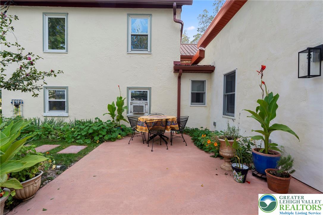 Eo Little Creek Road Bangor, PA 18013 - Photo 13 of 57 a backyard of a house with table and chairs