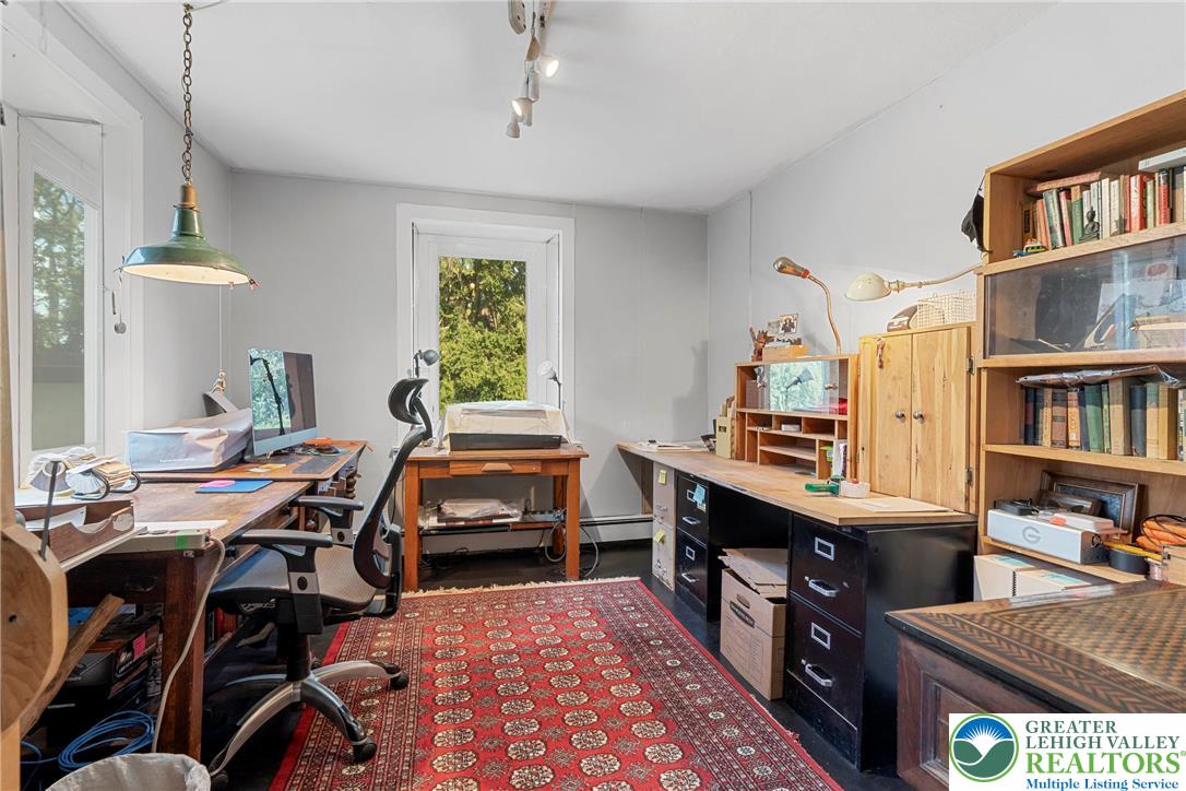 Eo Little Creek Road Bangor, PA 18013 - Photo 15 of 57 a room with furniture a bookshelf and a window
