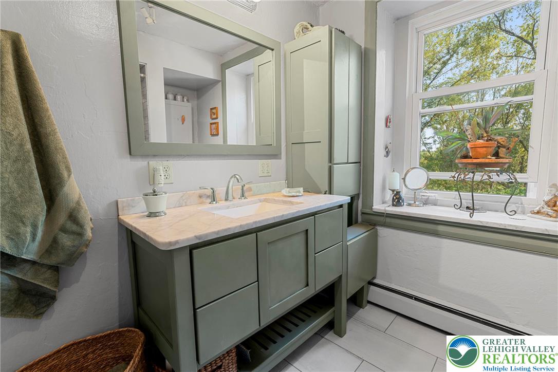 Eo Little Creek Road Bangor, PA 18013 - Photo 17 of 57 a bathroom with a sink and a mirror