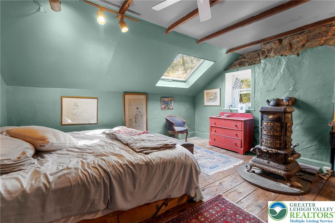 Eo Little Creek Road Bangor, PA 18013 - Photo 18 of 57 a bedroom with a bed dresser and a window