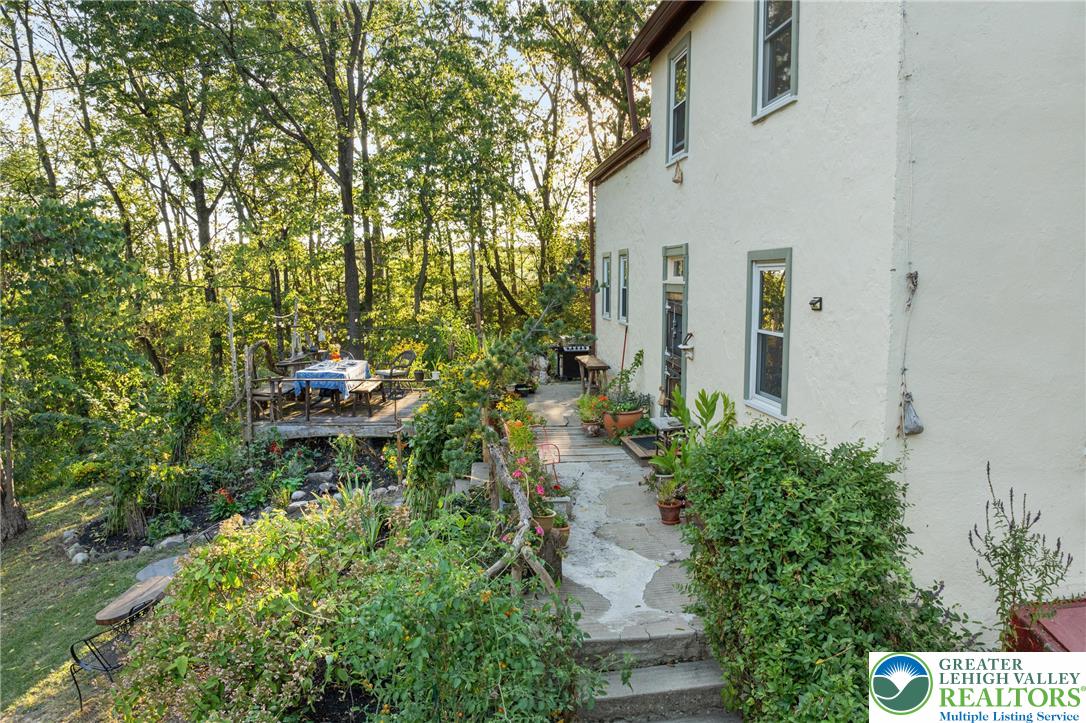 Eo Little Creek Road Bangor, PA 18013 - Photo 2 of 57 a backyard of a house with table and chairs