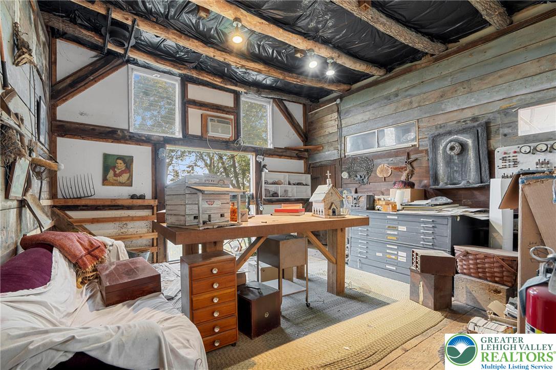 Eo Little Creek Road Bangor, PA 18013 - Photo 23 of 57 a view of a livingroom with furniture and a fireplace