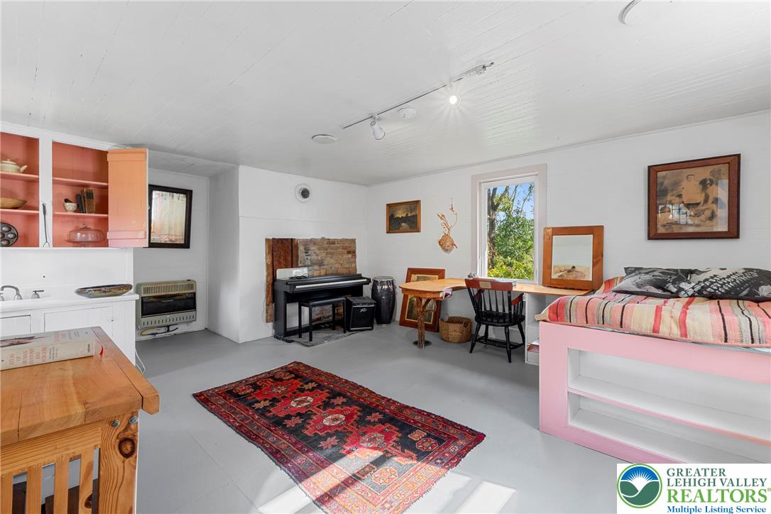 Eo Little Creek Road Bangor, PA 18013 - Photo 25 of 57 a living room with furniture a rug and a piano