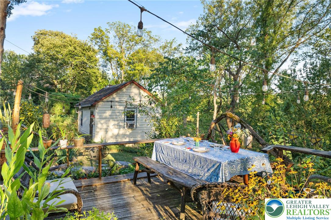 Eo Little Creek Road Bangor, PA 18013 - Photo 35 of 57 a view of a house with a chairs and table in a patio