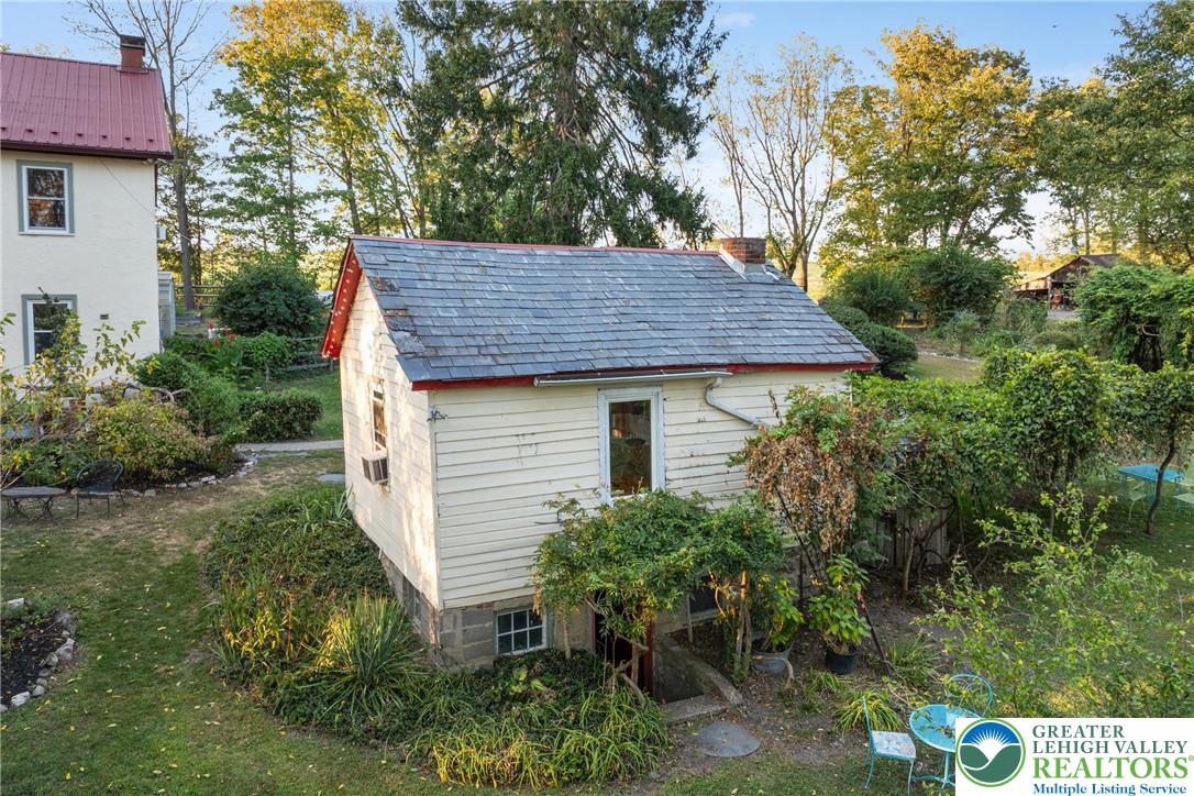 Eo Little Creek Road Bangor, PA 18013 - Photo 41 of 57 a view of a house with a yard and potted plants