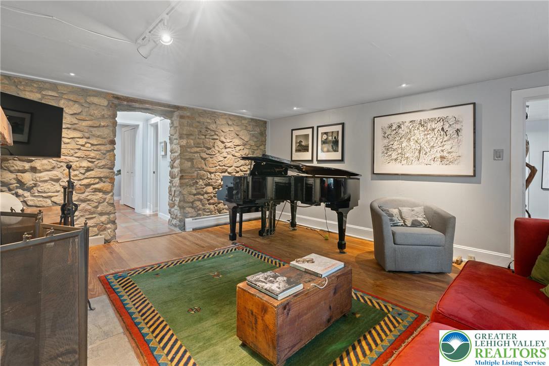 Eo Little Creek Road Bangor, PA 18013 - Photo 5 of 57 a living room with furniture and a flat screen tv