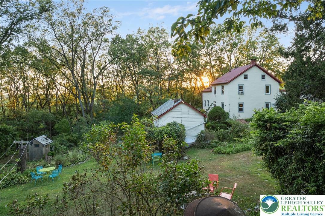 Eo Little Creek Road Bangor, PA 18013 - Photo 54 of 57 a front view of a house with a yard and garage