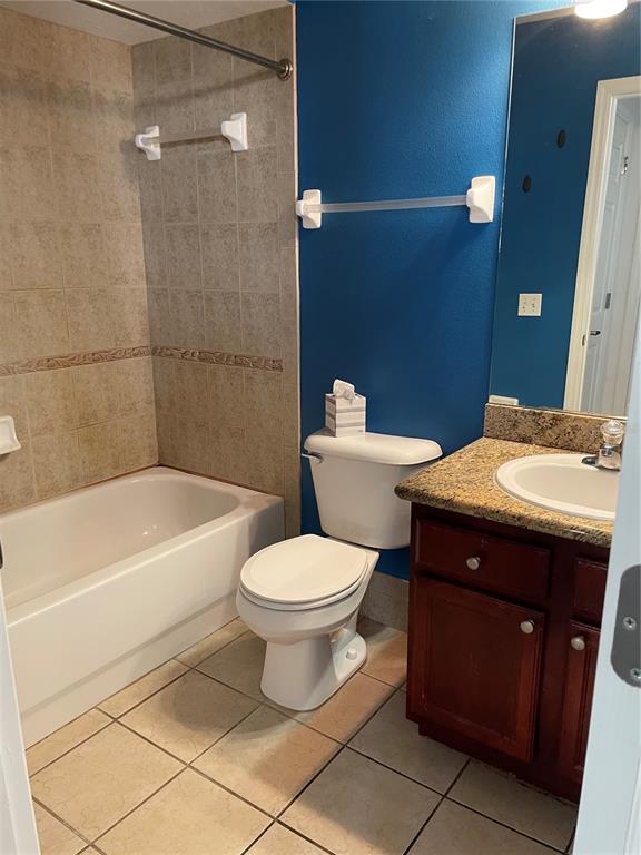 9311 Villa Entrada New Port Richey, FL 34655 - Photo 9 of 16 a bathroom with a sink a toilet and shower