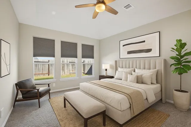 a bathroom with a granite countertop sink a mirror a bathtub and shower