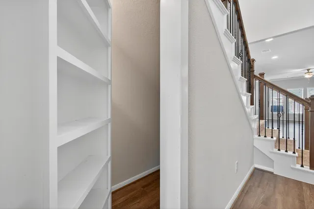 a utility room with sink dryer and washer