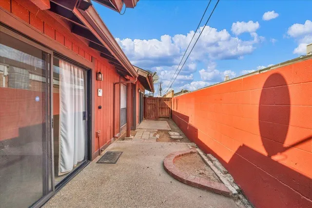 a backyard of a house with seating space