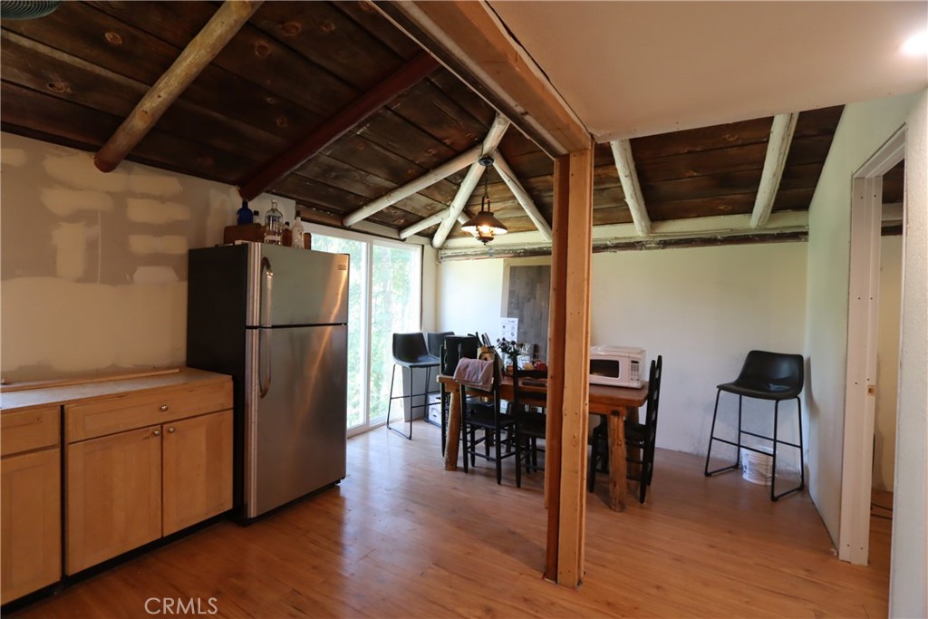 10354 Mulberry Street Middletown, CA 95461 - Photo 14 of 18 a view of a chairs in kitchen and an empty room