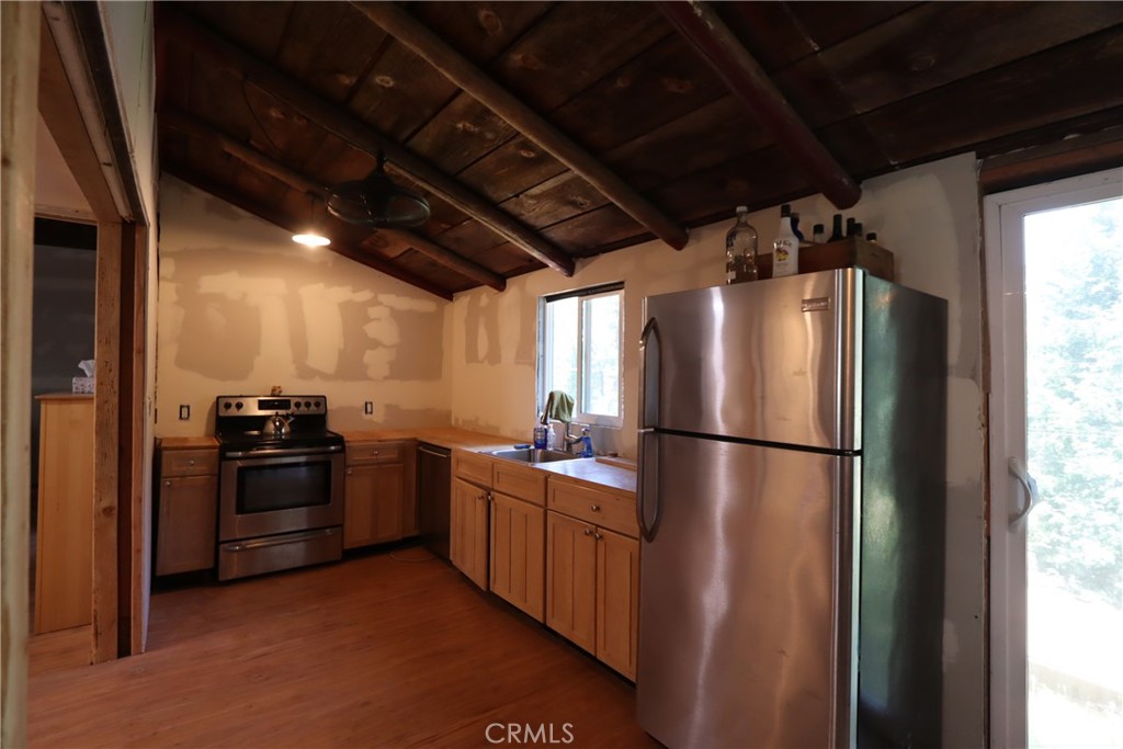 10354 Mulberry Street Middletown, CA 95461 - Photo 15 of 18 a kitchen with stainless steel appliances granite countertop a refrigerator and a stove