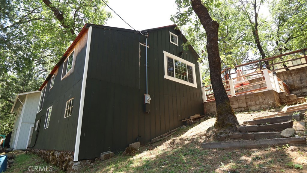 10354 Mulberry Street Middletown, CA 95461 - Photo 18 of 18 a backyard of a house with large trees