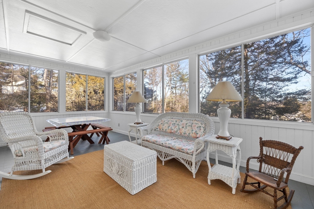 27 Locust Avenue Lexington, MA 02421 - Photo 14 of 38 a living room with furniture and a large window