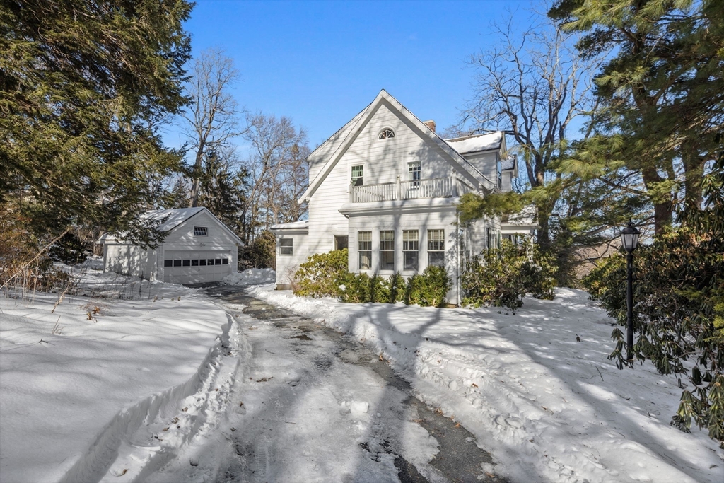 27 Locust Avenue Lexington, MA 02421 - Photo 26 of 38 a view of a large house with a street