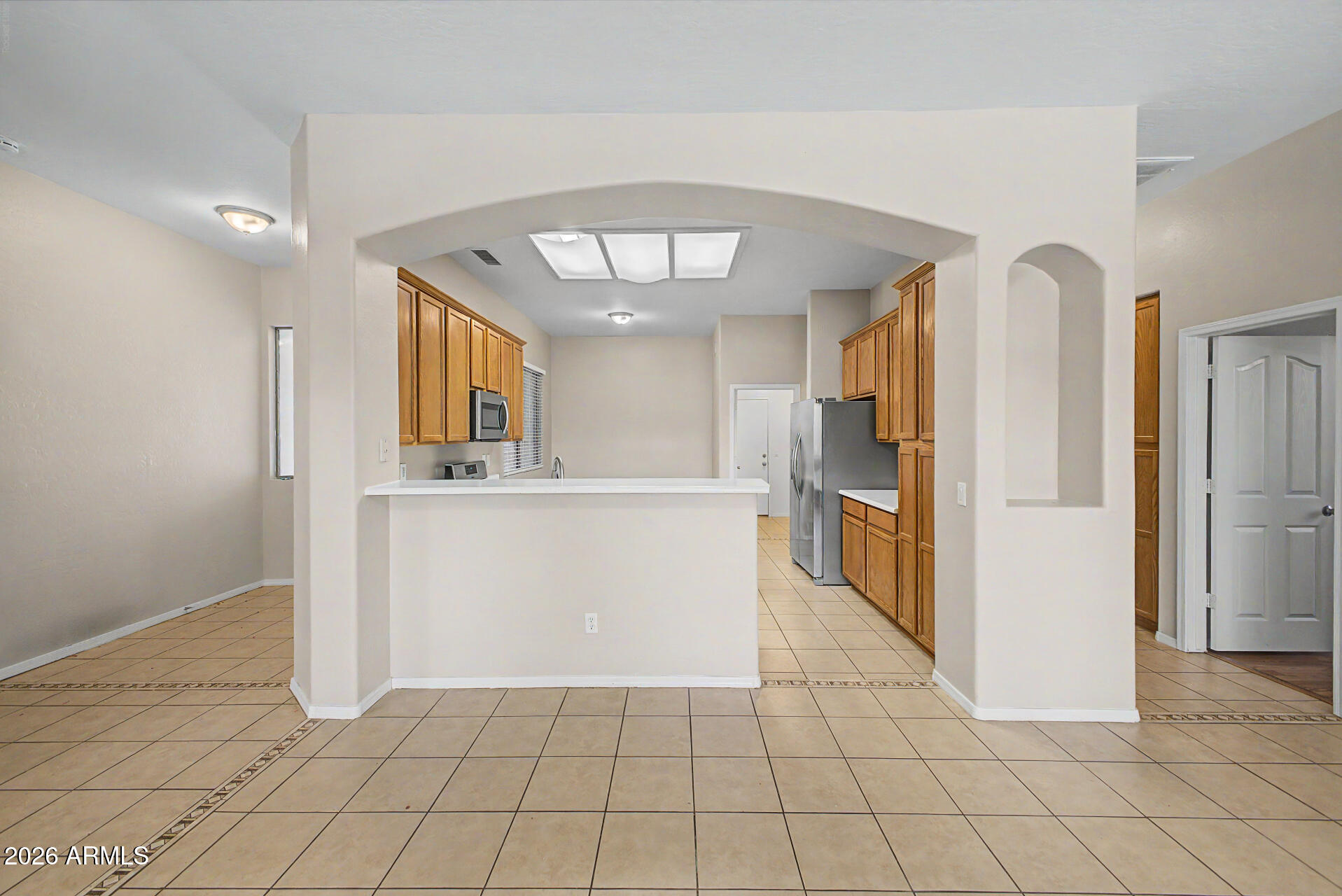 11199 West Monte Vista Road Avondale, AZ 85392 - Photo 6 of 36 a view of a kitchen with a sink