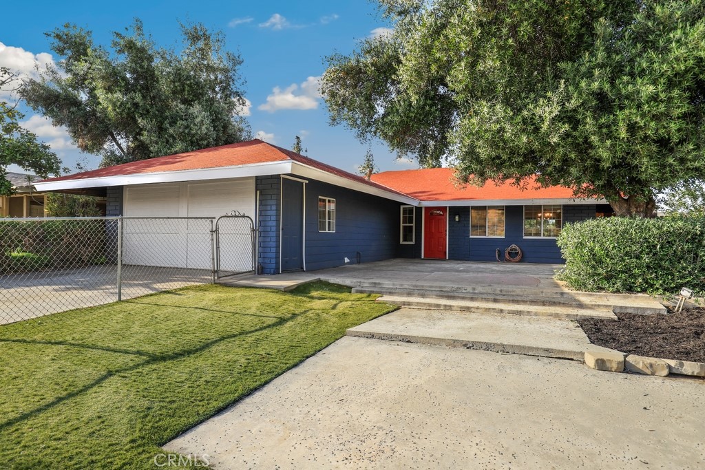 4607 Challen Avenue Riverside, CA 92503 - Photo 1 of 1 a front view of a house with a yard