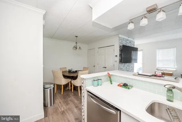 a view of a kitchen and a kitchen