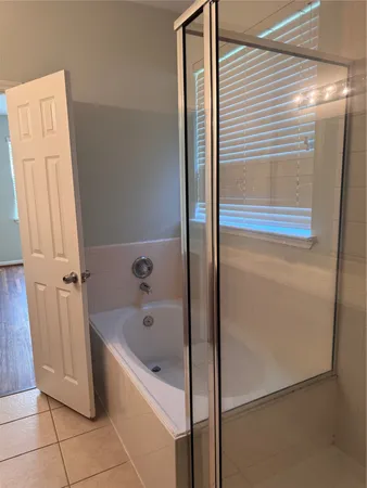 a bathroom with a bathtub