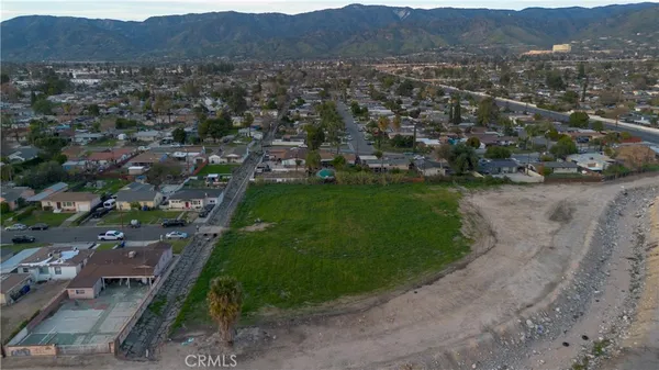 an aerial view of residential house and green space