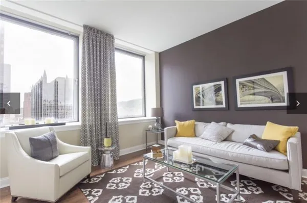 a living room with furniture and a couch