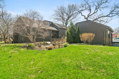 a view of a garden with an outdoor space