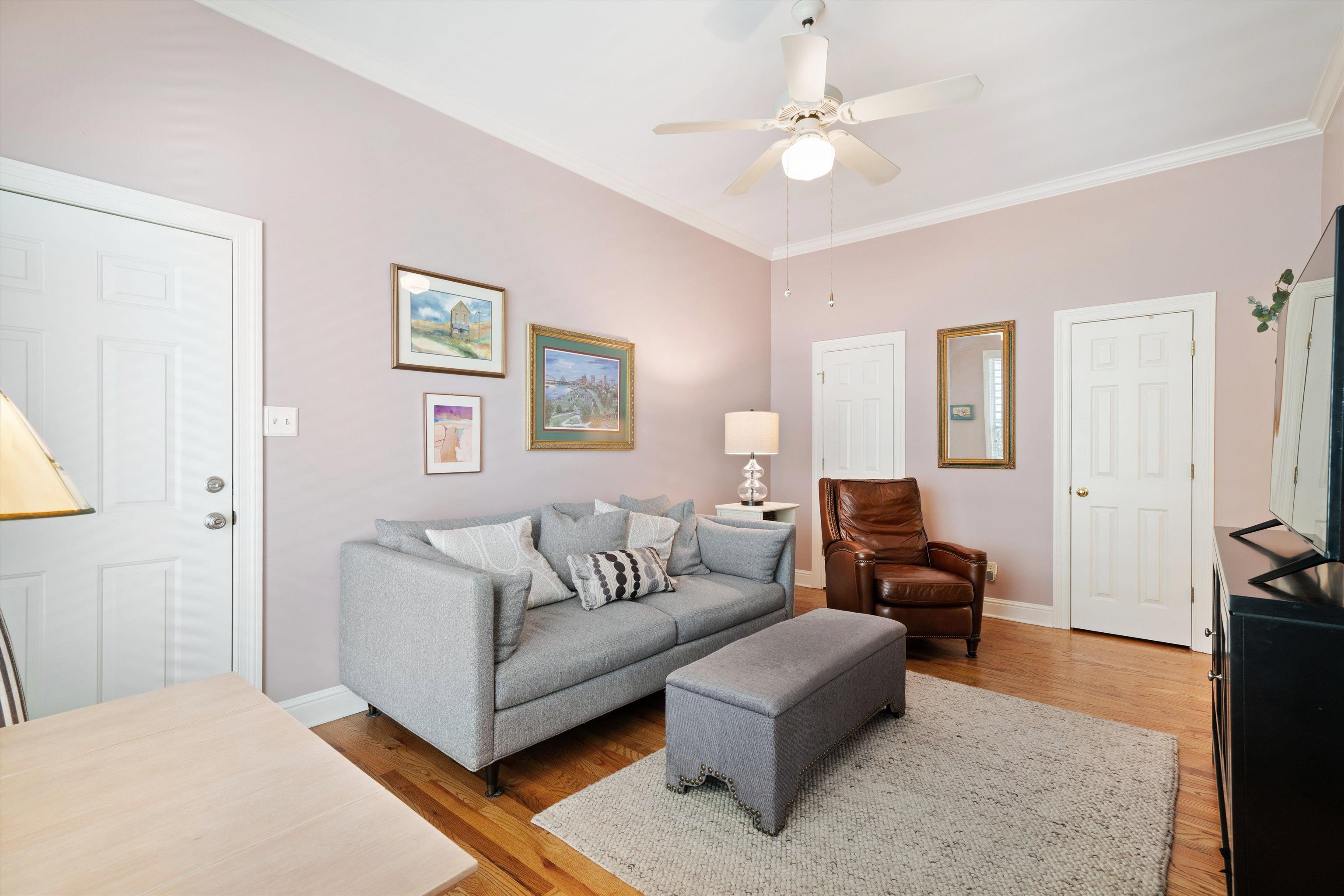 1005 River Currents Drive Memphis, TN 38103 - Photo 11 of 37 a living room with furniture and a table