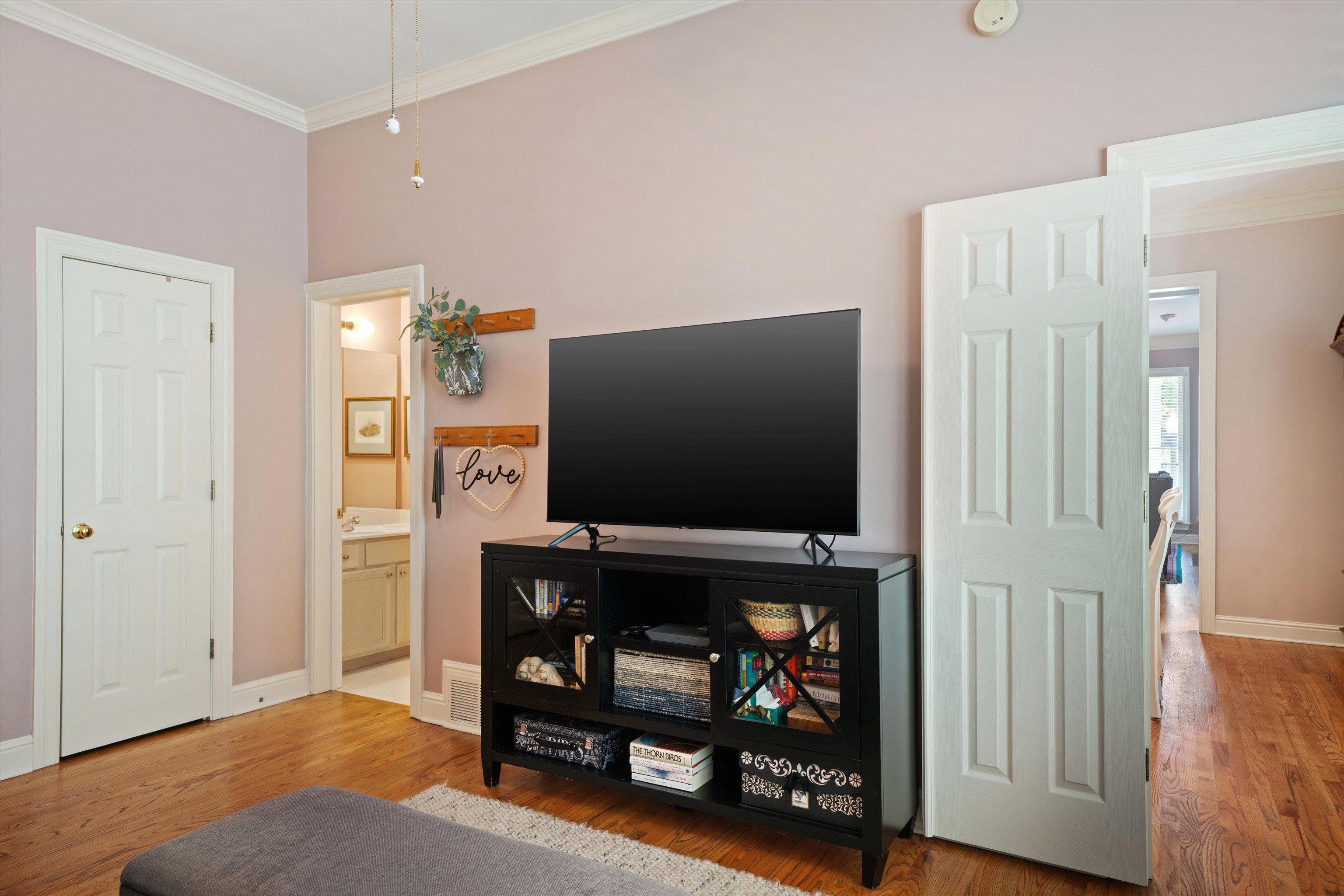 1005 River Currents Drive Memphis, TN 38103 - Photo 12 of 37 a living room with furniture and a flat screen tv