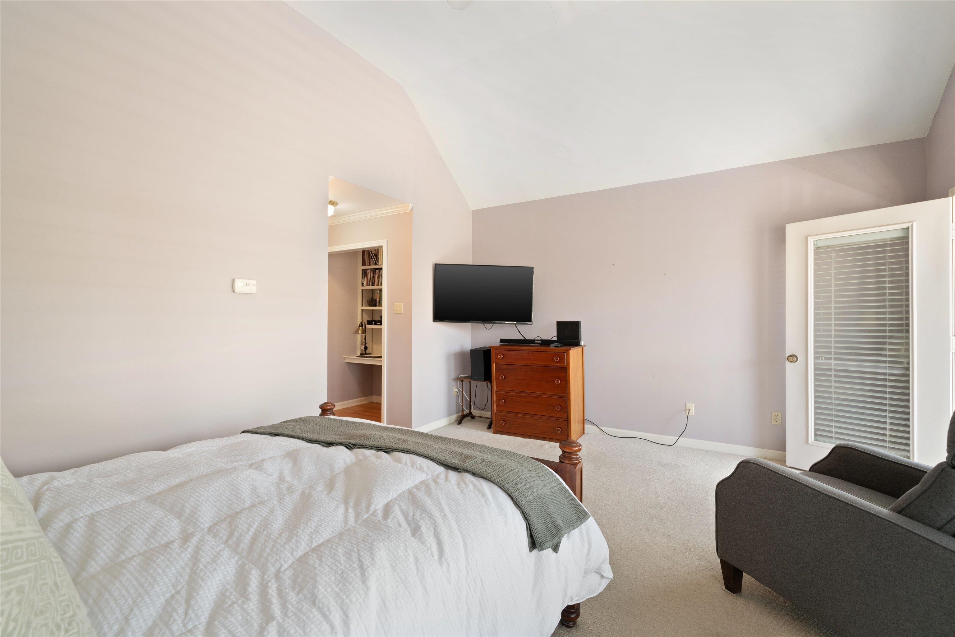 1005 River Currents Drive Memphis, TN 38103 - Photo 15 of 37 a bedroom with a bed and a television