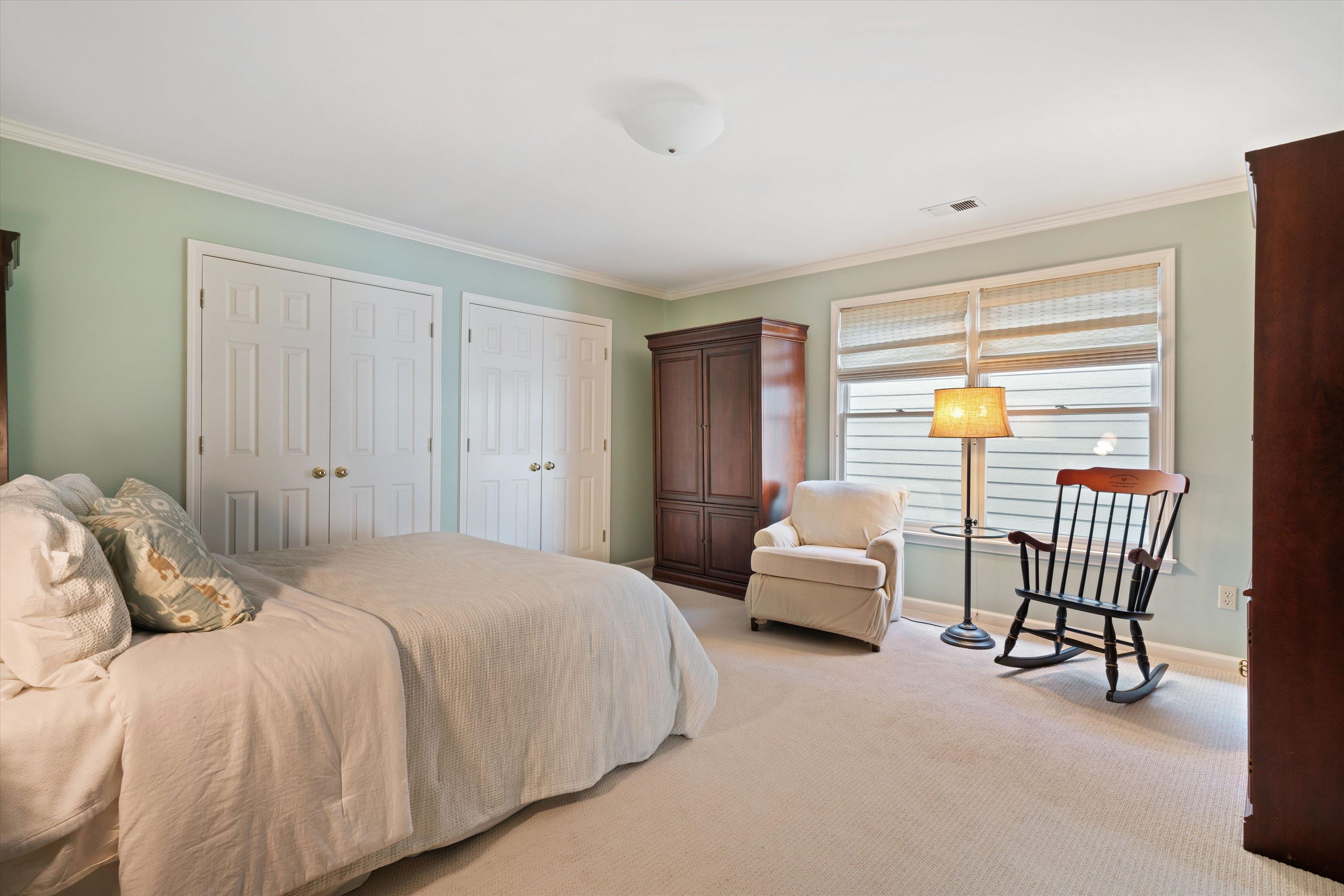 1005 River Currents Drive Memphis, TN 38103 - Photo 21 of 37 a spacious bedroom with a bed and a couch with outer view