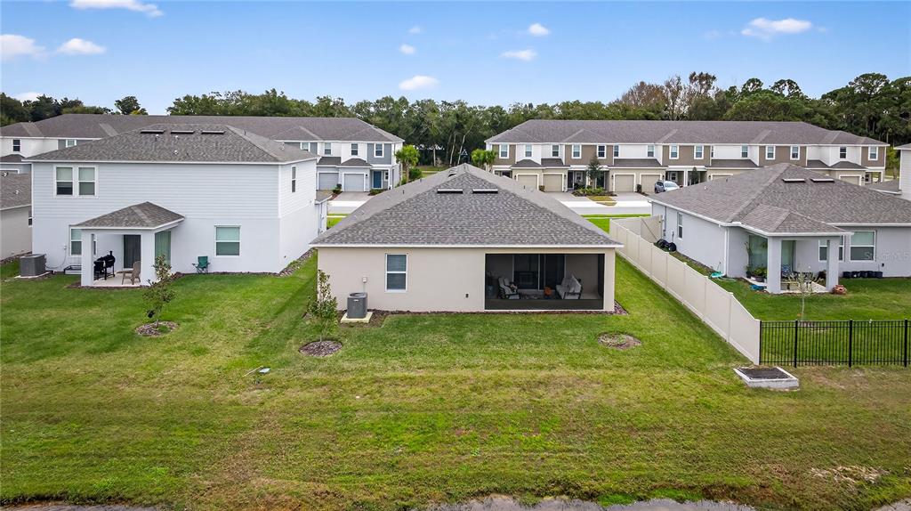 317 Riverfront Way Edgewater, FL 32141 - Photo 38 of 63 a front view of a house with a yard