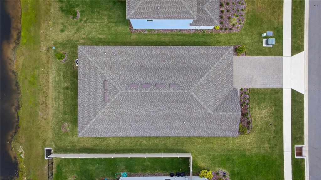 317 Riverfront Way Edgewater, FL 32141 - Photo 45 of 63 an aerial view of a house with a yard