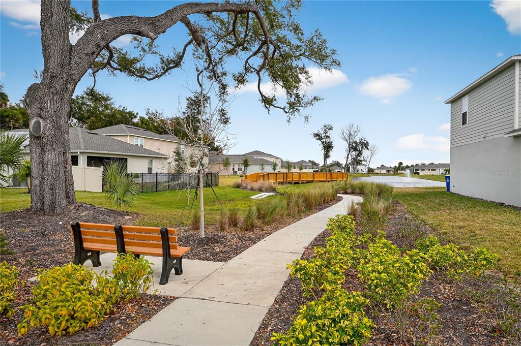 317 Riverfront Way Edgewater, FL 32141 - Photo 60 of 63 a view of a lake with couches in front of house